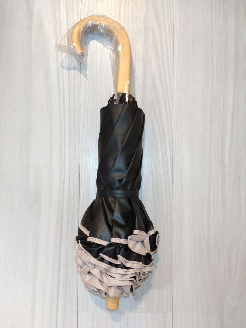 みゃお　サンバリア100 折りたたみ日傘 ２段折 フリル ピンク 木曲がり