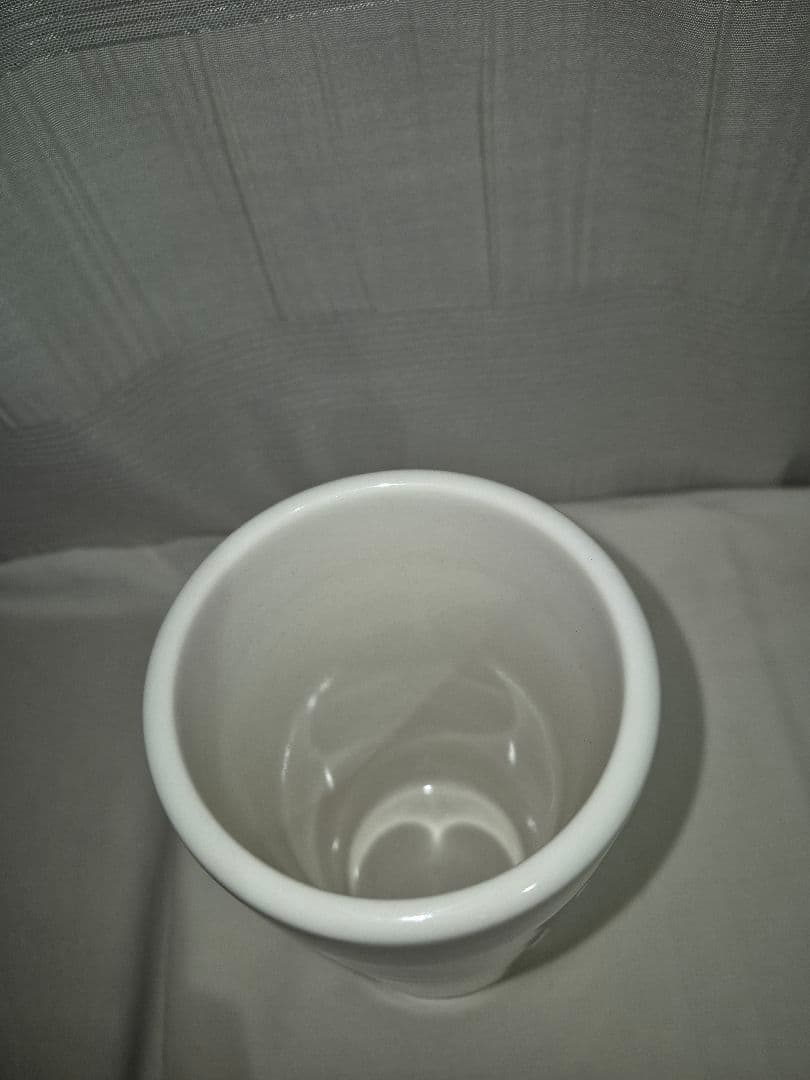 低温調理器とスタンドと本2冊