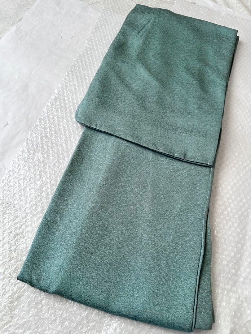 a09【在庫処分・特価】未使用 青緑 織柄 正絹 色無地 裄 64.5