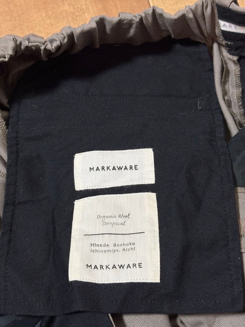 MARKAWARE オーガニックウールサバイバルクロス ペグトップ トラウザース