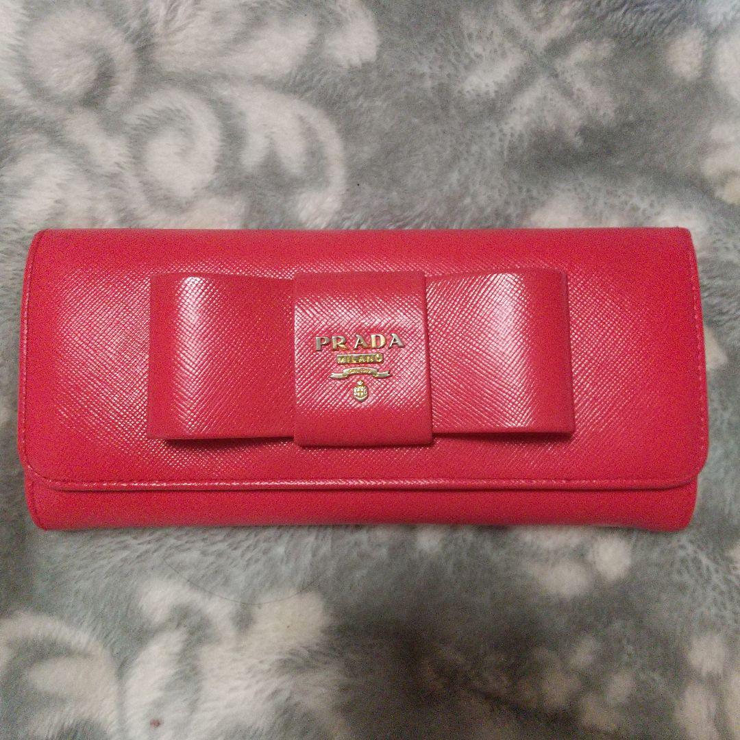 PRADAサフィアーノ リボン付き 長財布オレンジ系