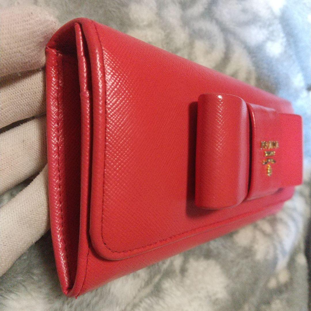 PRADAサフィアーノ リボン付き 長財布オレンジ系