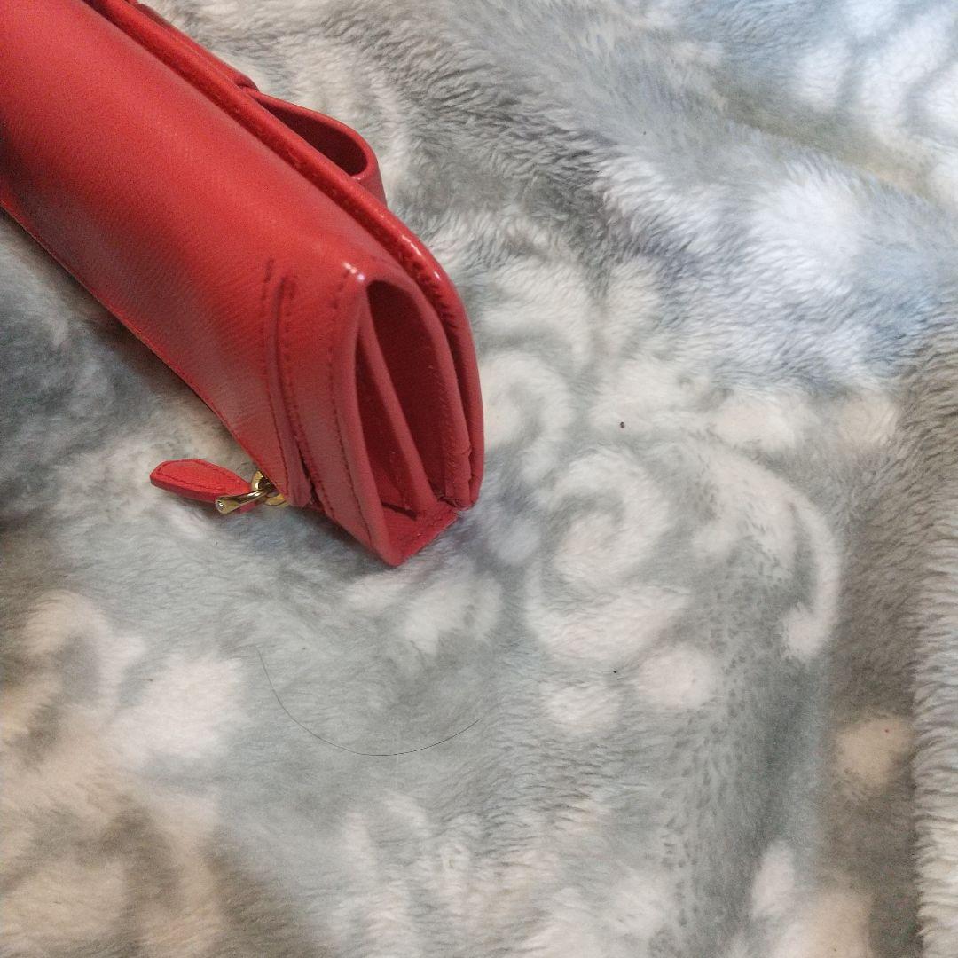 PRADAサフィアーノ リボン付き 長財布オレンジ系