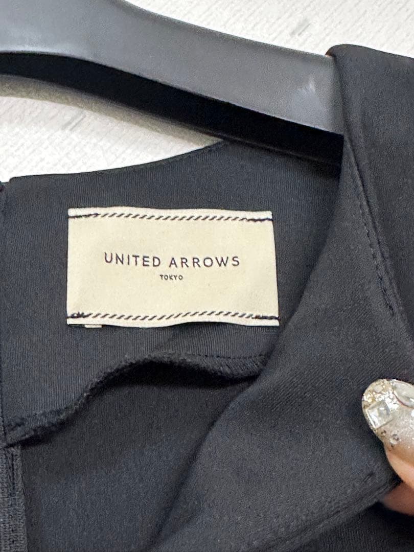 【新品】　UNITED ARROWS パールモチーフペプラムヴラウス