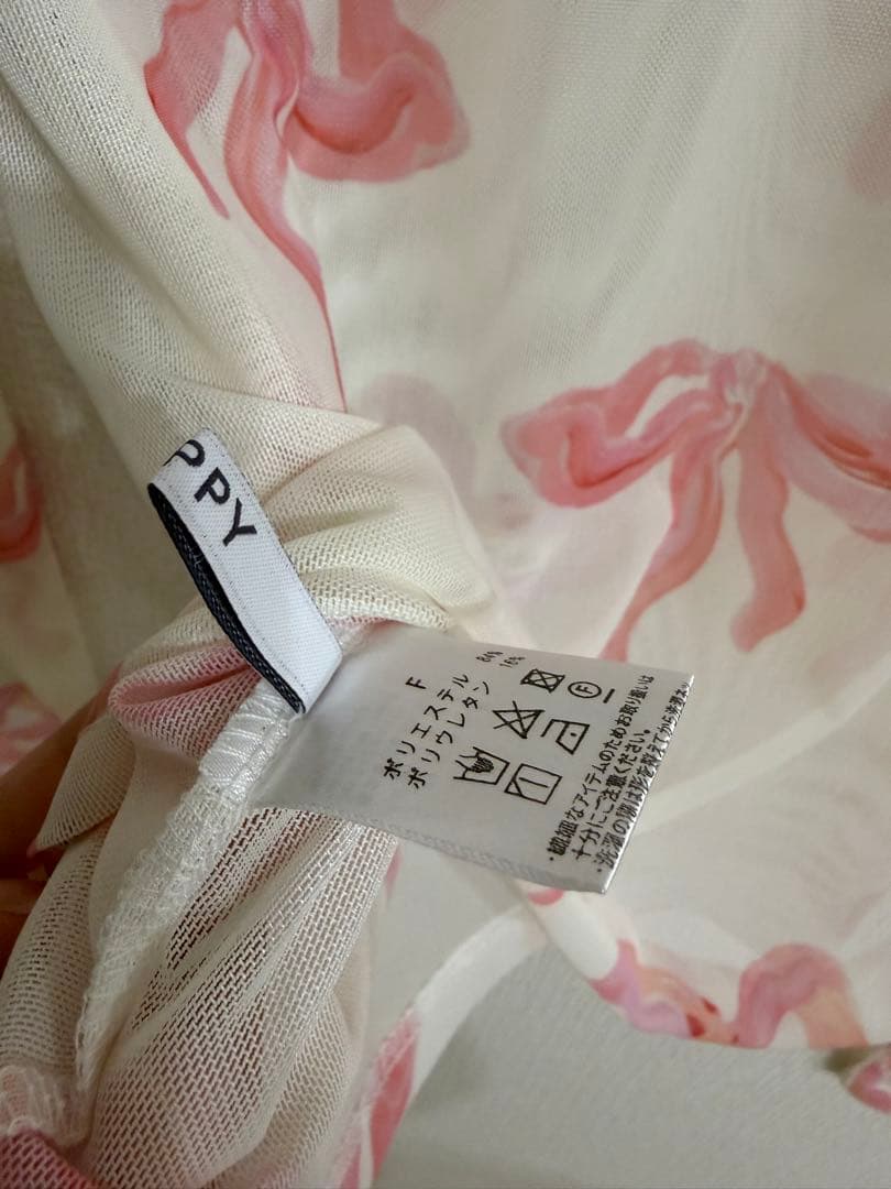 poppy シースルートップス　ピンクリボン