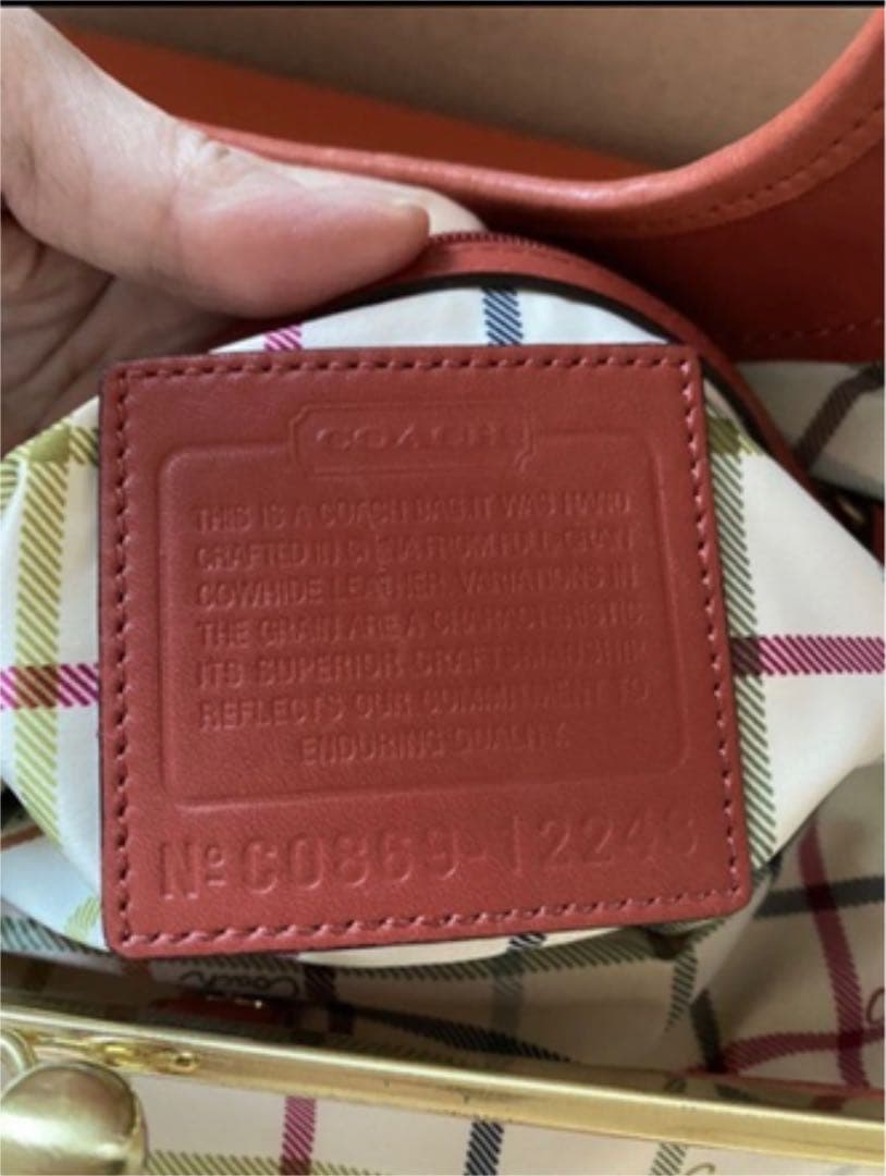 コーチ　オレンジ　エルゴレザープリーテッドフレームドサッチェル