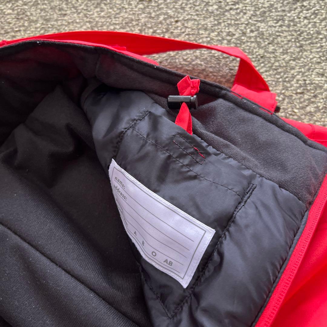 Phenix スキーウェアセット（赤系パンツ・黒系のジャケット） 135-155