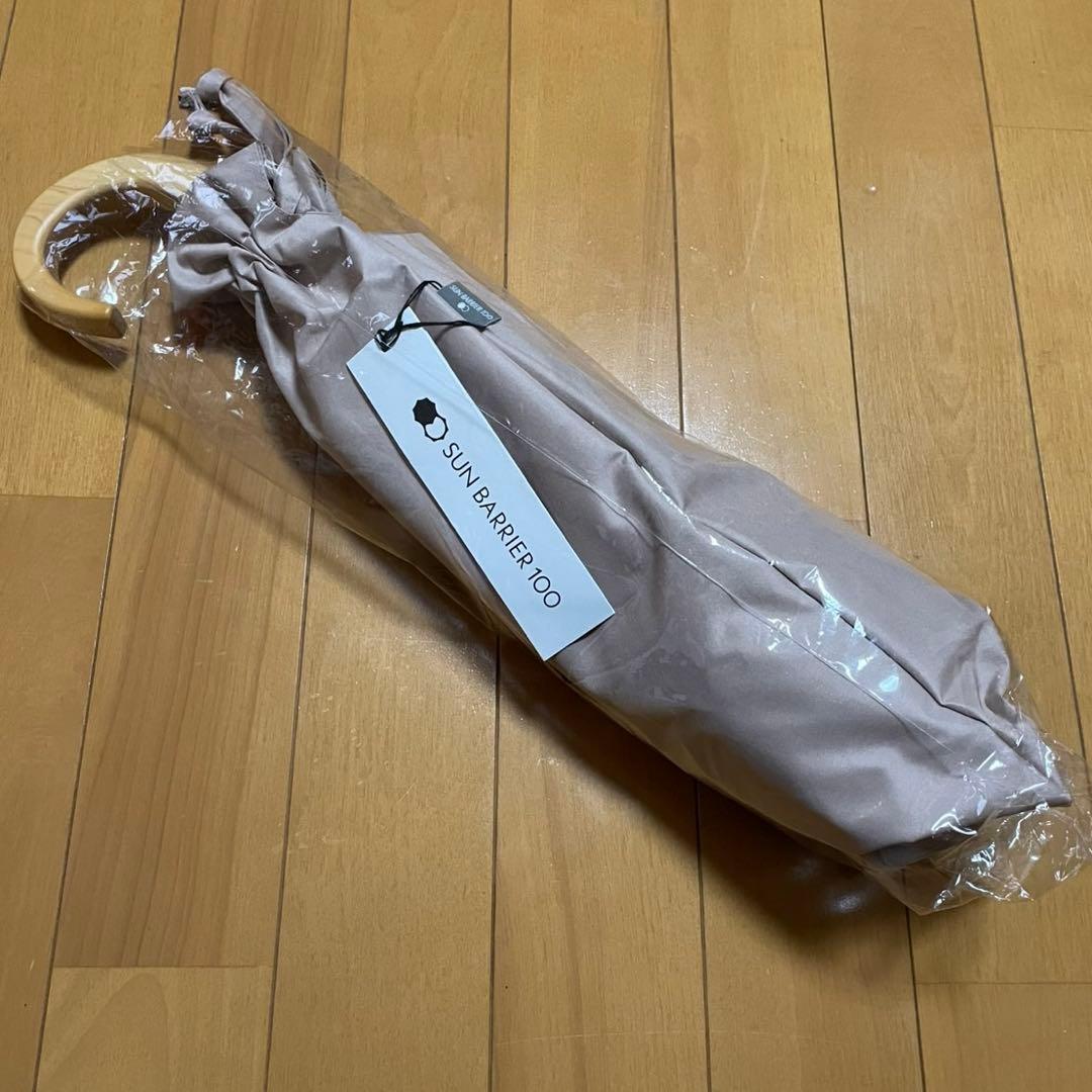 新品未使用 サンバリア100 完全遮光日傘 2段折フリル ピンク
