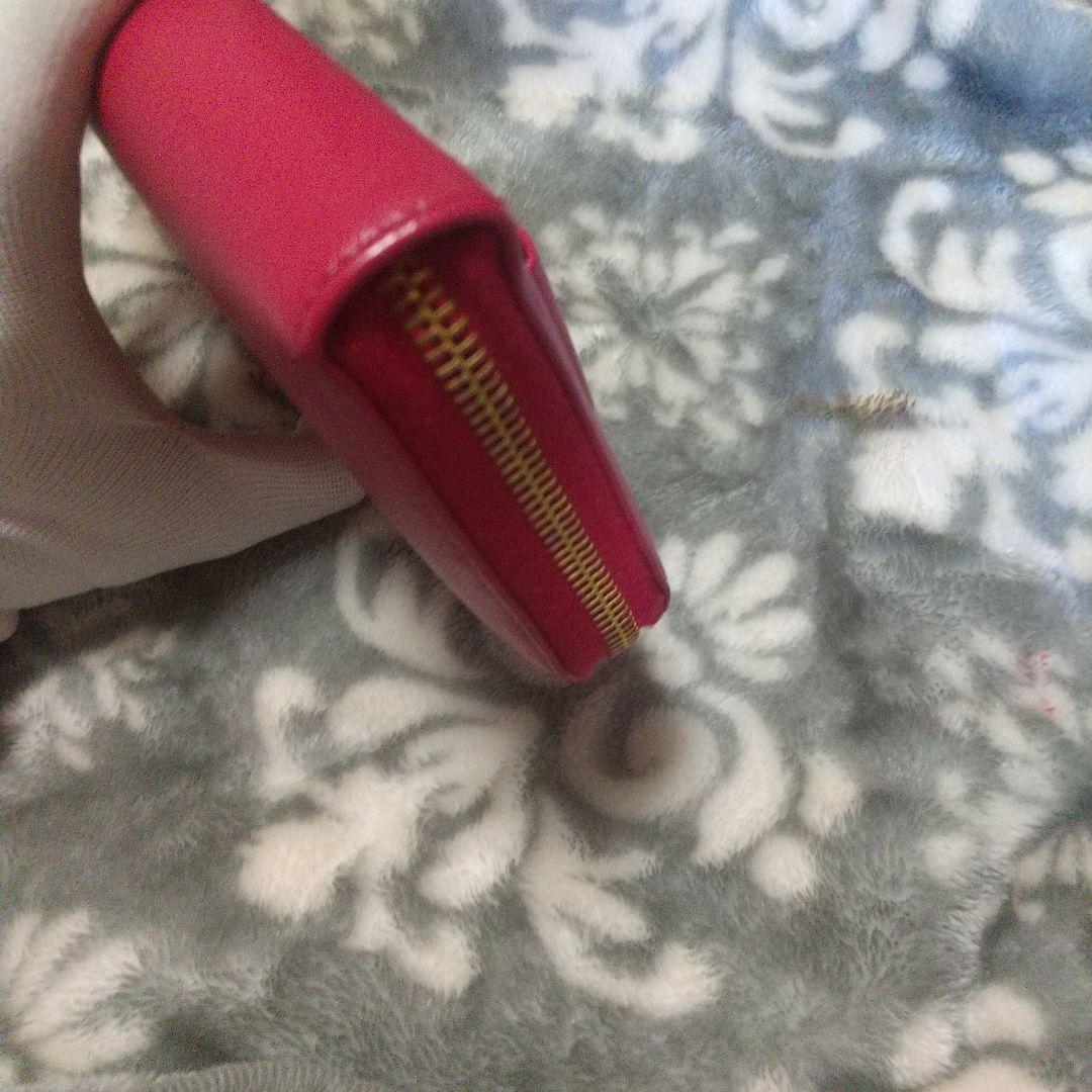 PRADA サフィアーノラウンドファスナーリボン付き長財布 レッド系