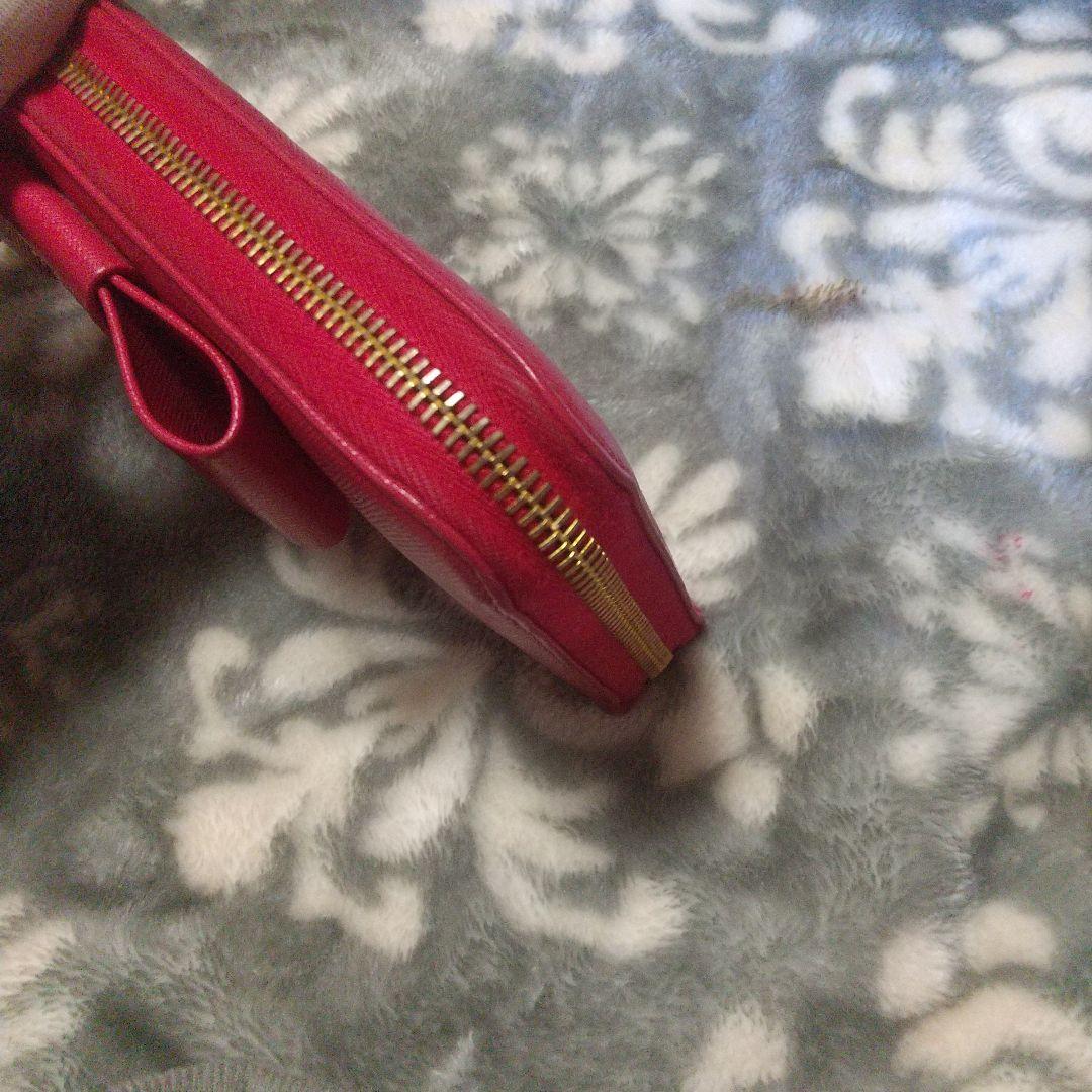 PRADA サフィアーノラウンドファスナーリボン付き長財布 レッド系