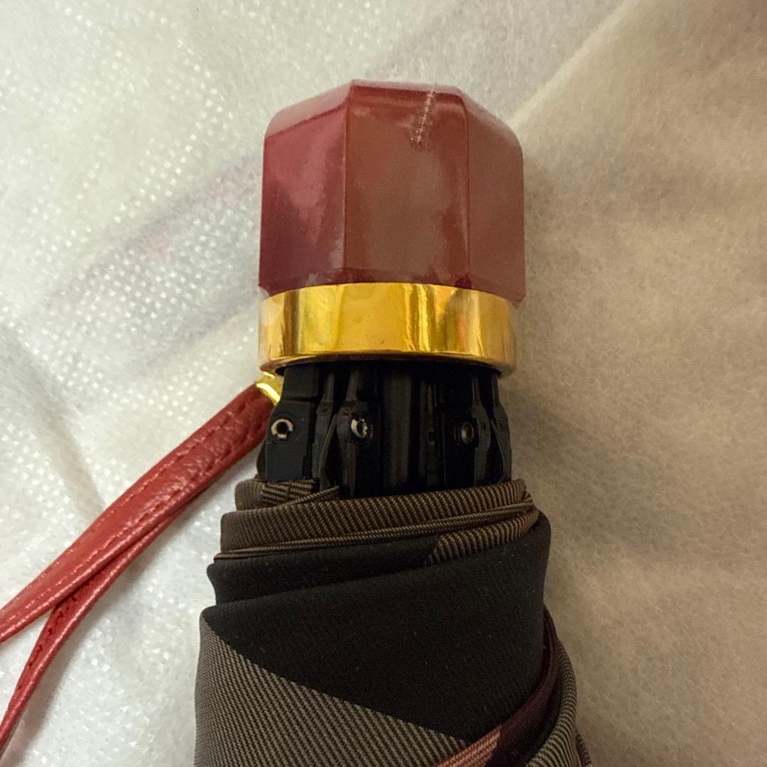 ブルーレーベル、赤系チェック柄 折りたたみ傘 収納ケース付き