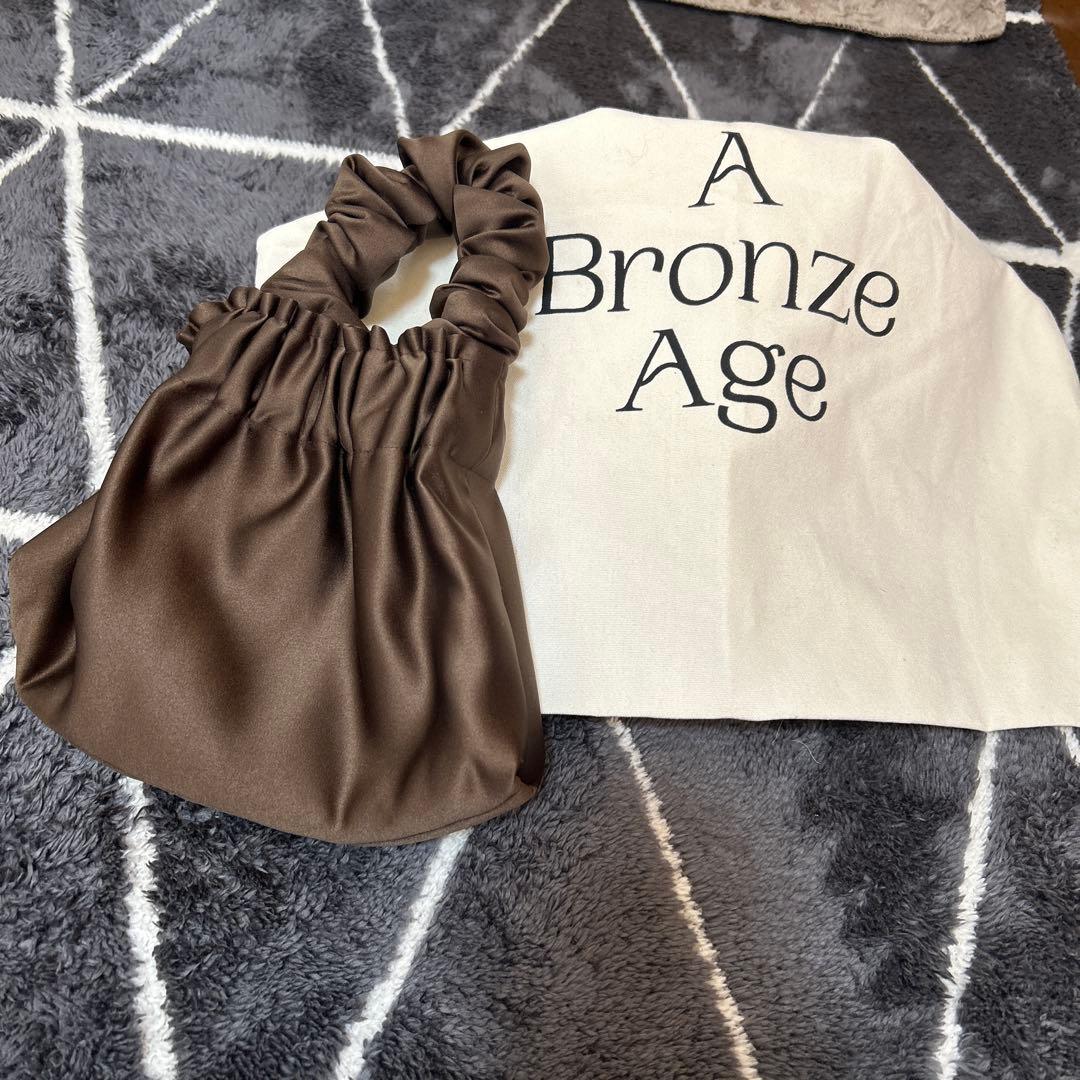 A Bronze Age ブロンズエイジサテンバッグ HALOBAG