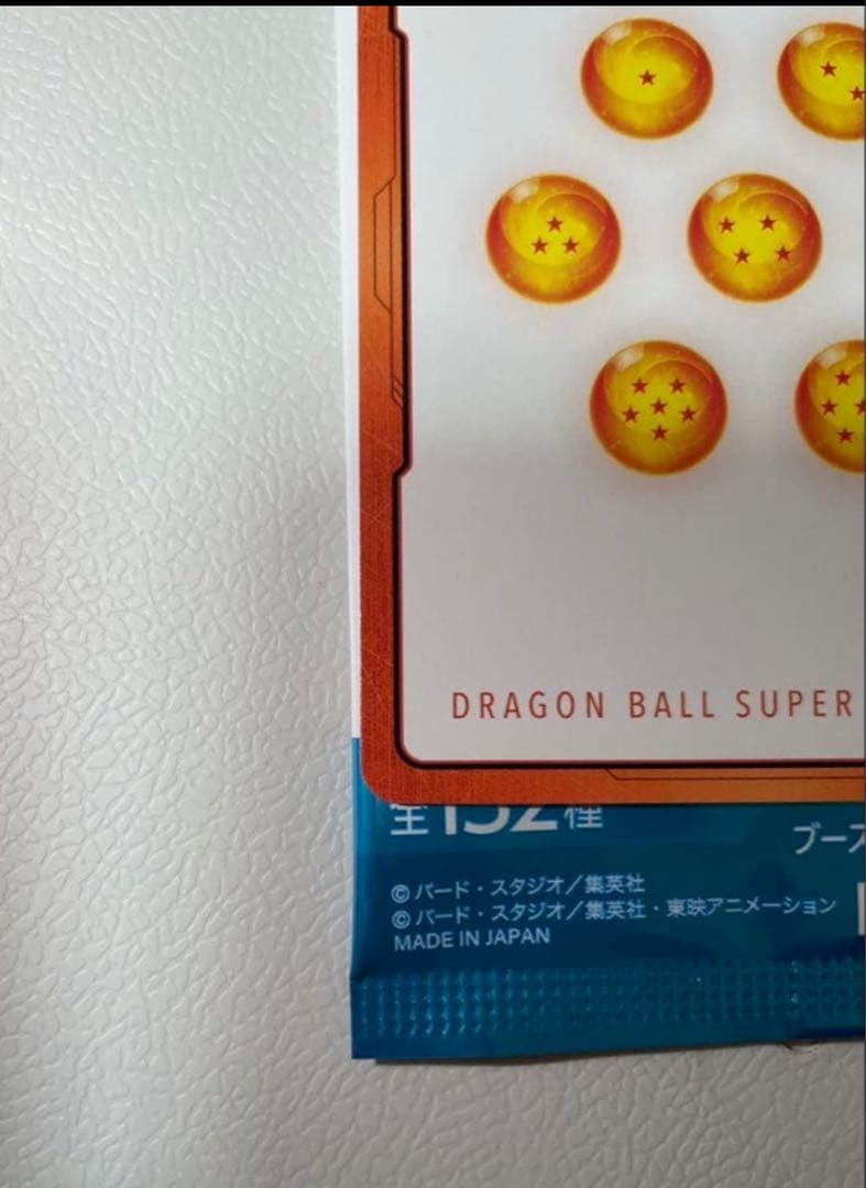 漫画ブースター2 エナジーマーカー 金 E-90 パラレル 42巻 表紙