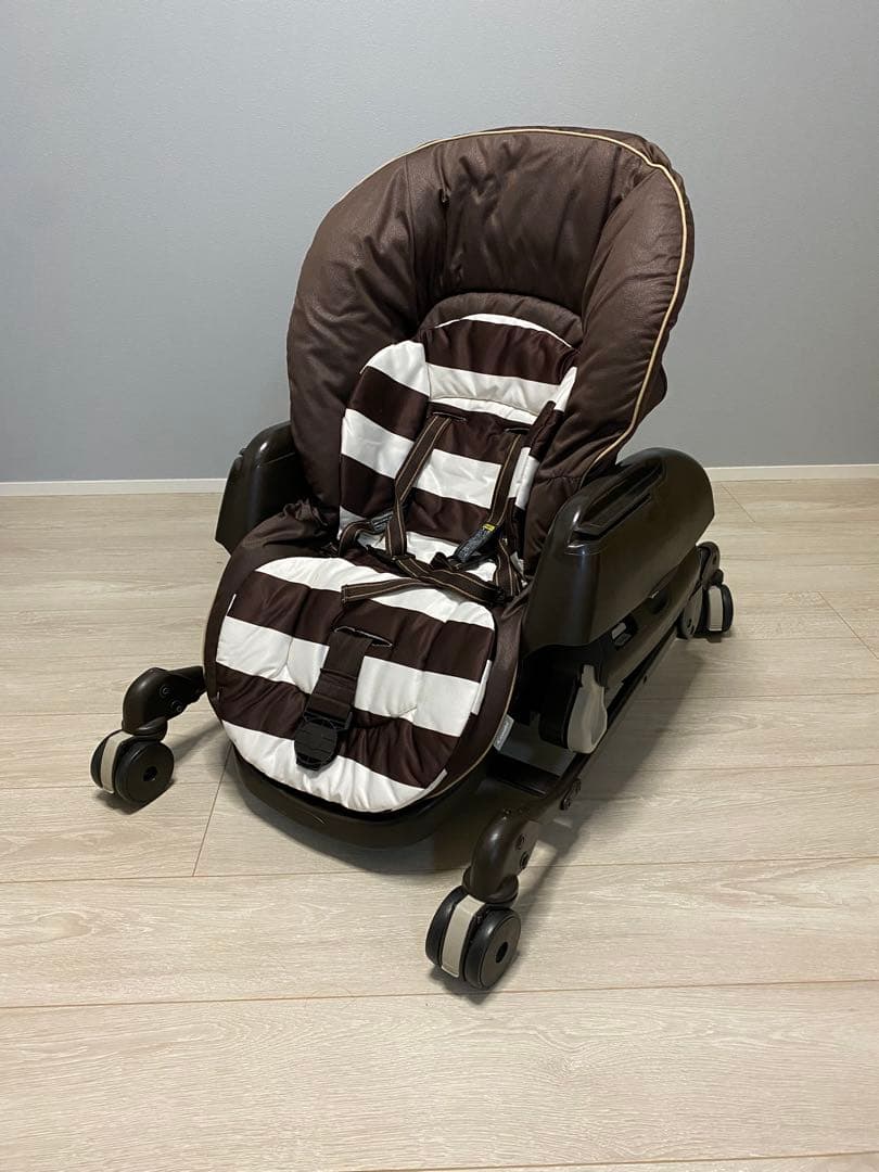 Combi ネムリラ　4キャスAT スイングチェア　自動　ハイローチェア