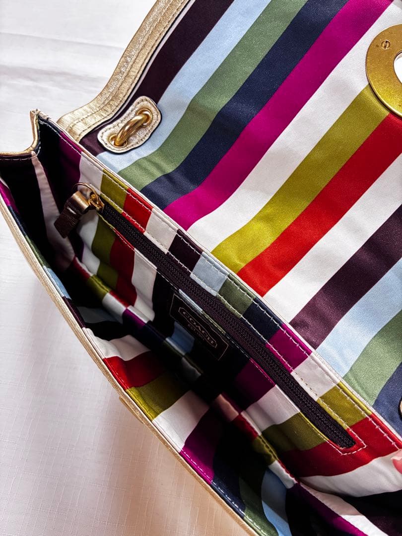 バッグ Coach legacy stripe turn lock llic