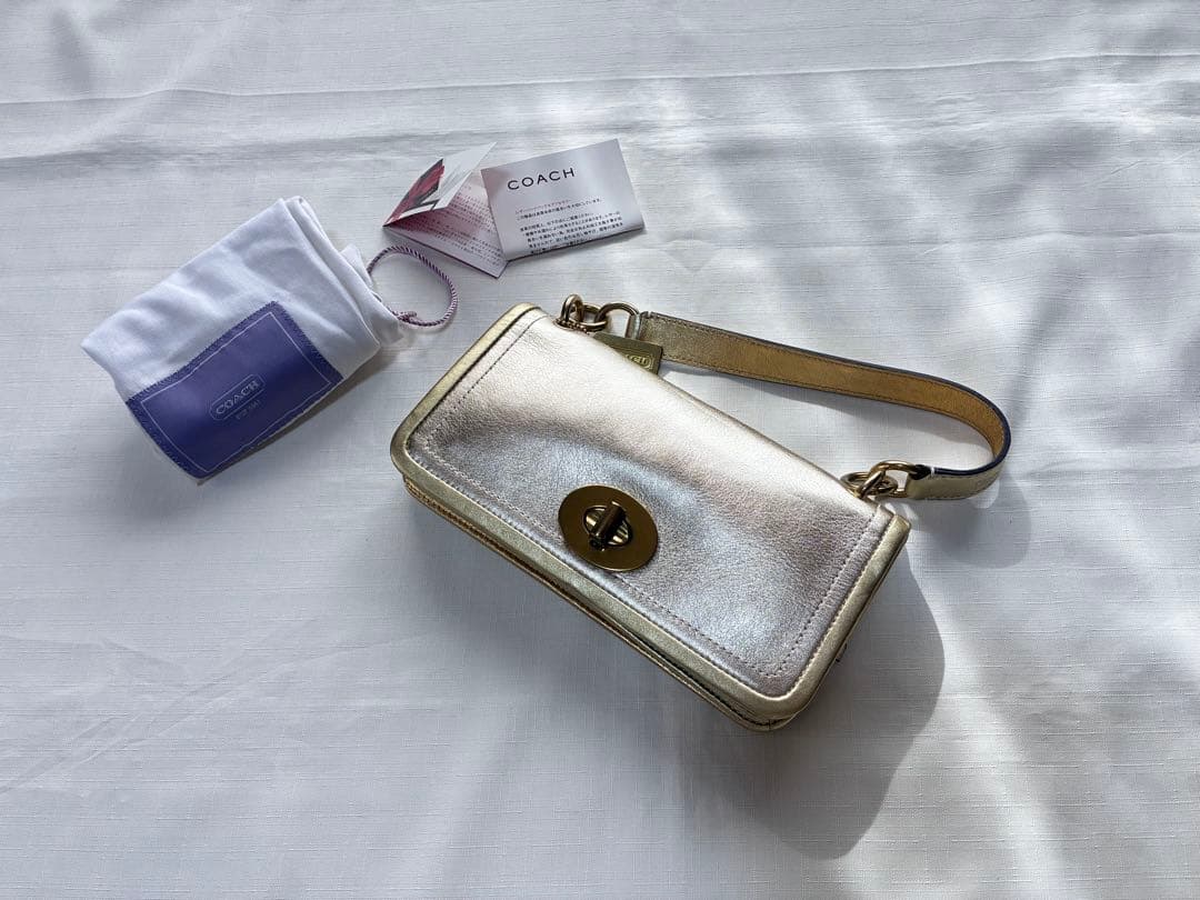 バッグ Coach legacy stripe turn lock llic