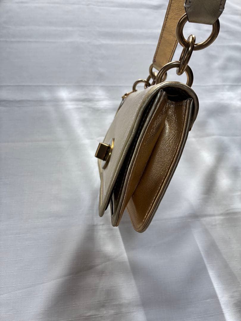 バッグ Coach legacy stripe turn lock llic