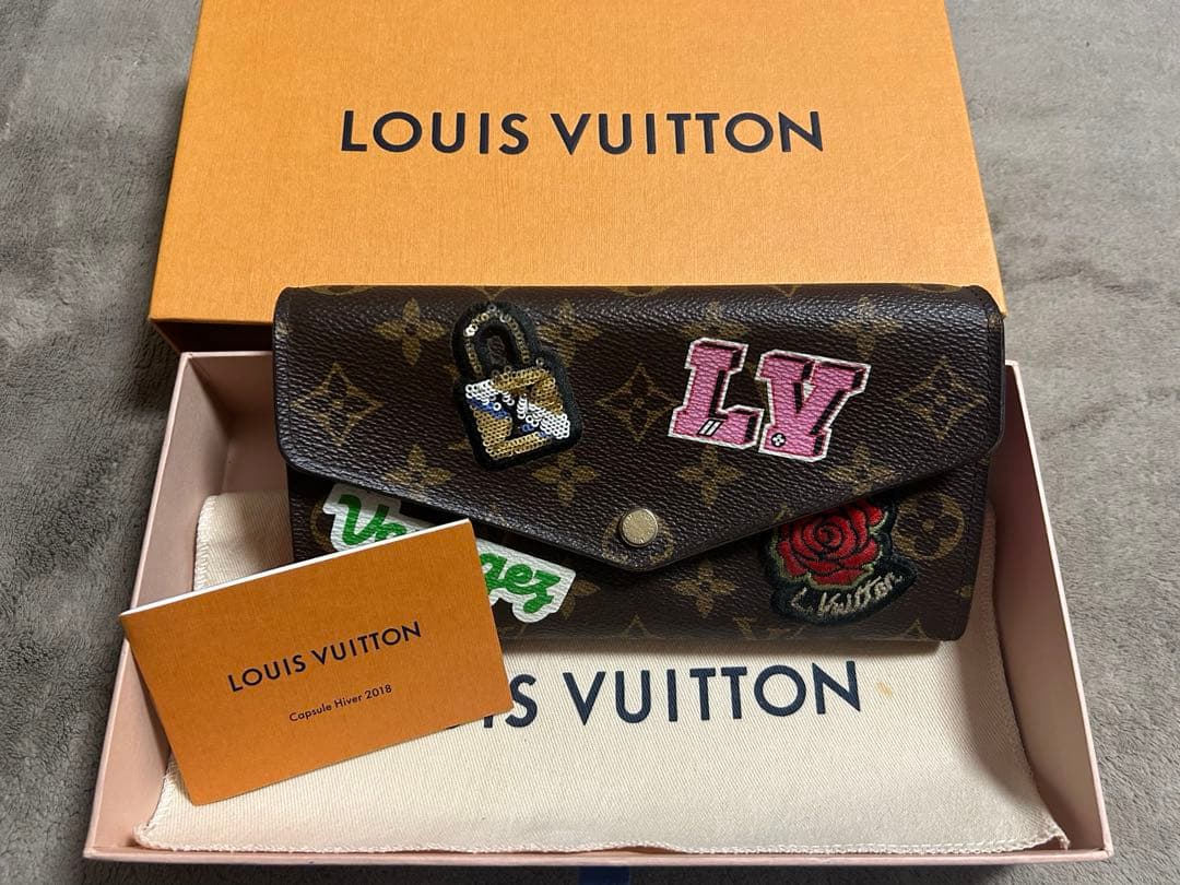 かぁ様　ルイヴィトン　ポルトフォイユ サラ パッチーズ M63318