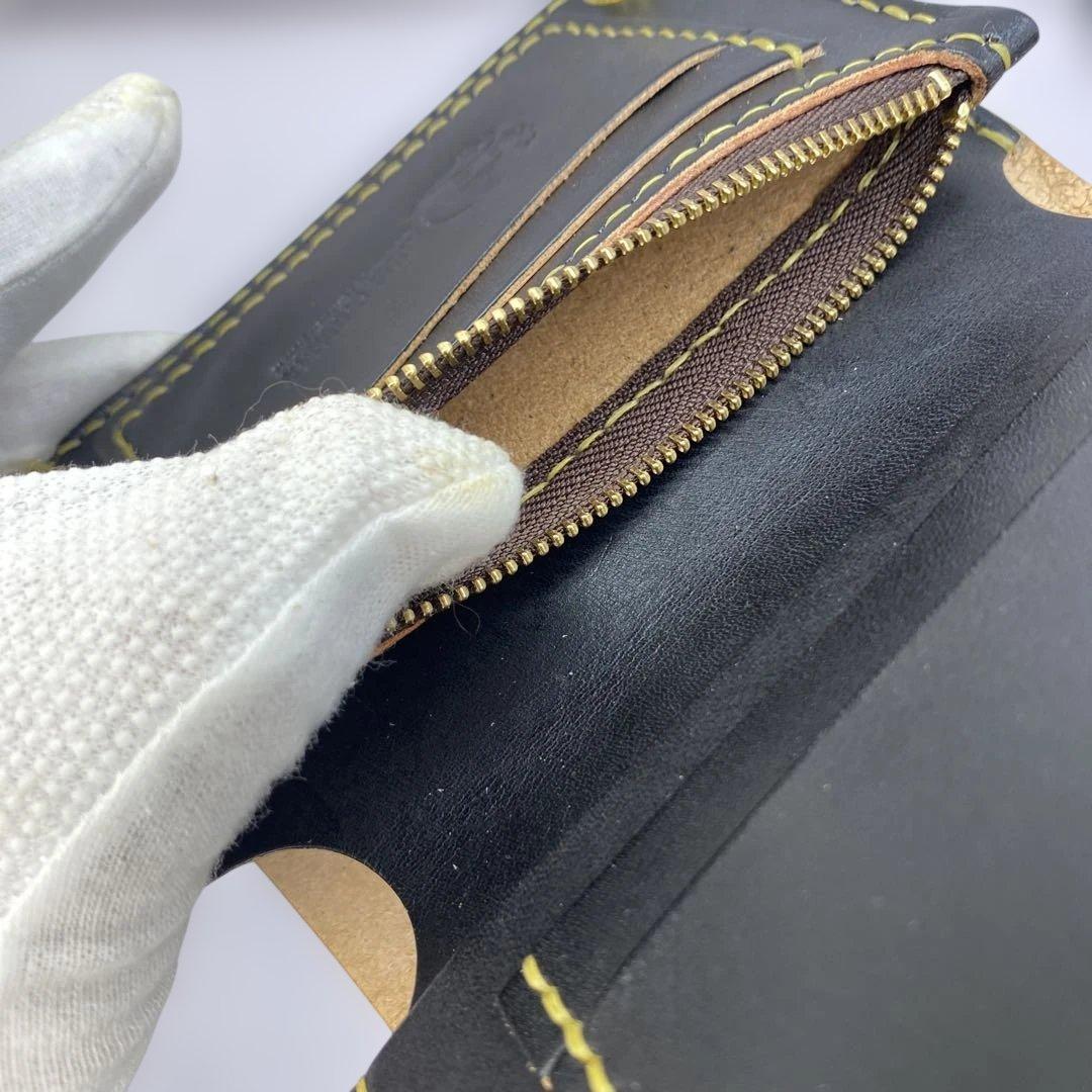 お札折らずに収納できる無骨な手染めミドルトラッカーウォレット BTW