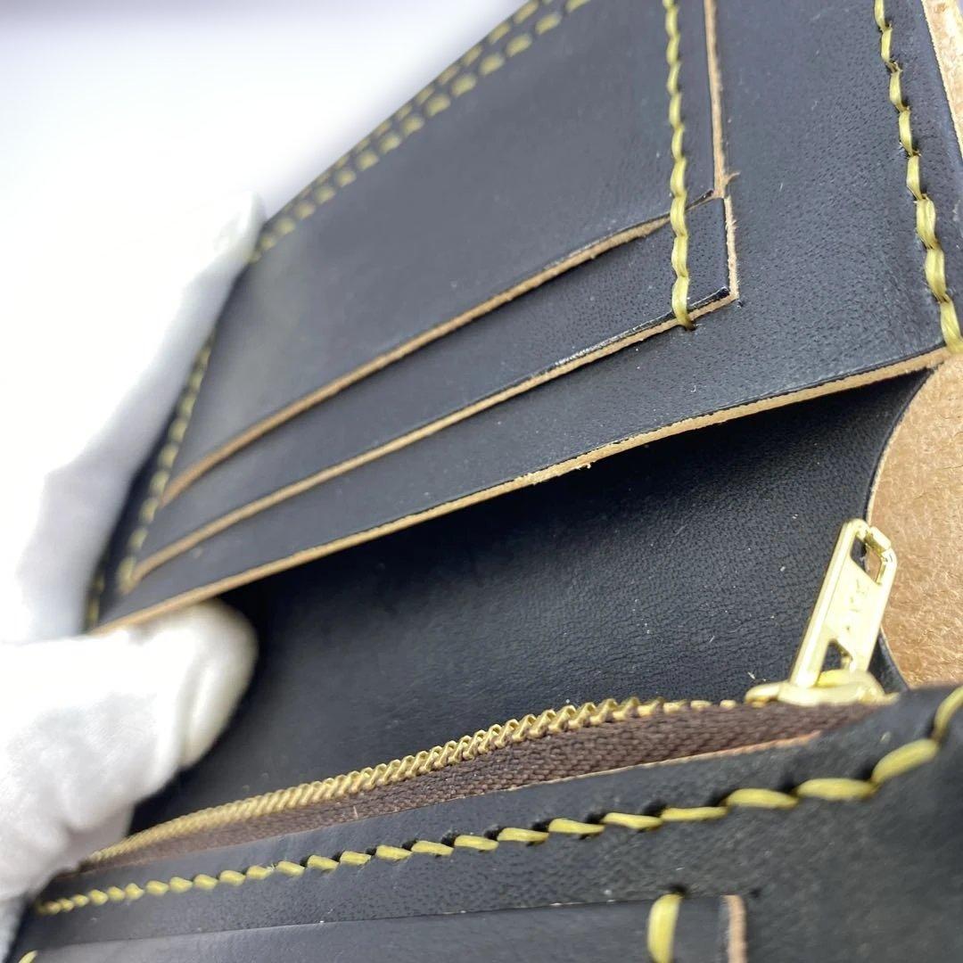 お札折らずに収納できる無骨な手染めミドルトラッカーウォレット BTW