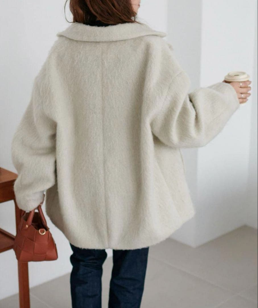 【新品未使用】早い者勝ち‼️Discoat シャギーミドルコート（アイボリー)