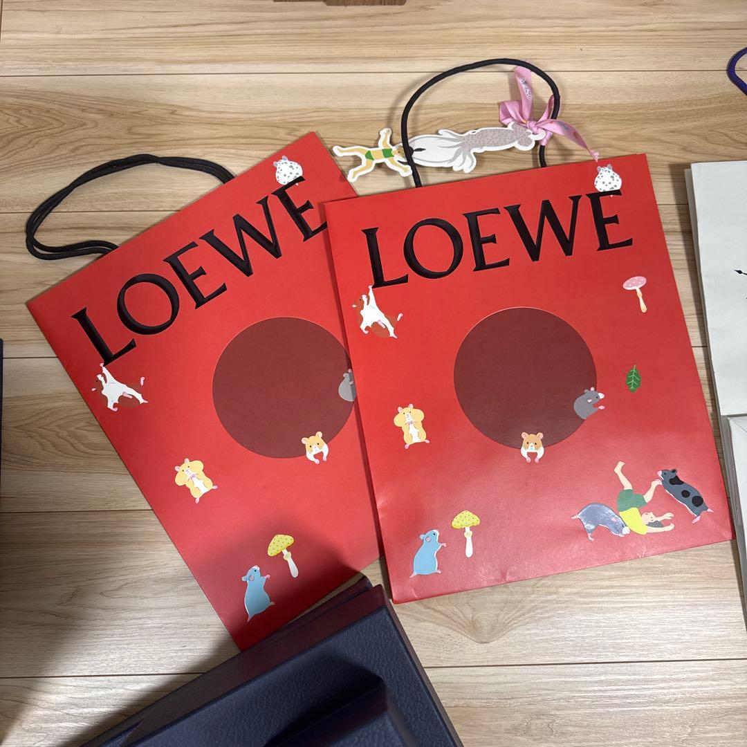 ヴィトンネックレス、ハイブランドショッパーと箱とチャーム