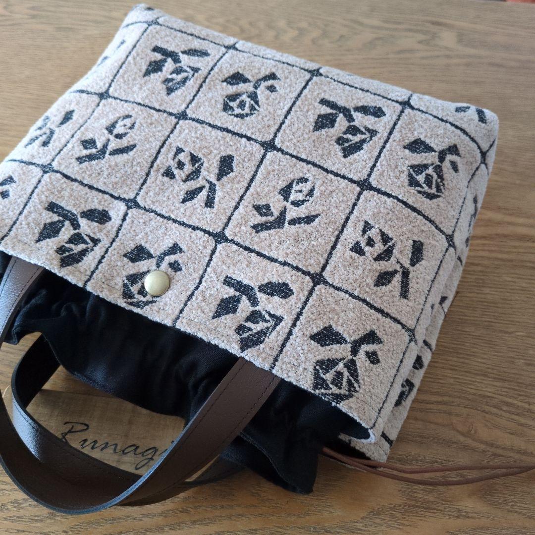 【1551】あおりポケットの巾着バッグ＊ミナペルホネン