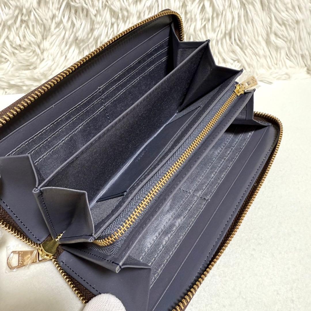 未使用 ラシット モノグラム プレート ラウンドジップ ウォレット 長財布