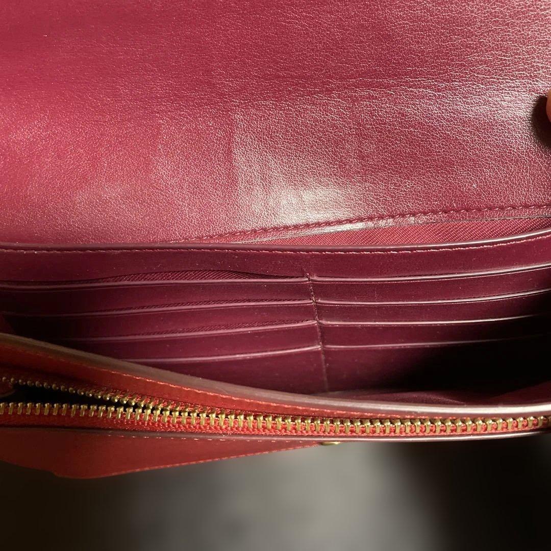 ゆずお値下げCOACH リンゴ柄 クラッチバッグ