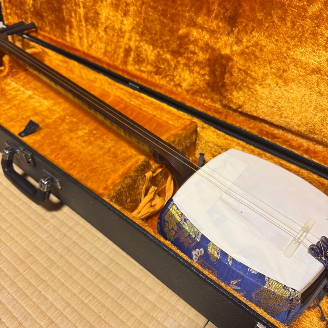 三味線　紫壇　中棹　丸打ち胴　破れ有り　本体ケース　2点セット