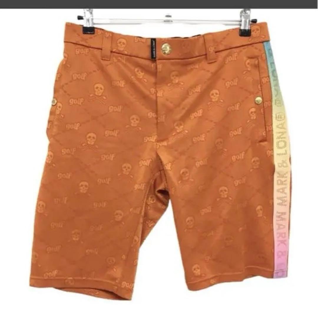 マークアンドロナ ハーフパンツ オレンジ スカル サイドロゴライン メンズ 48