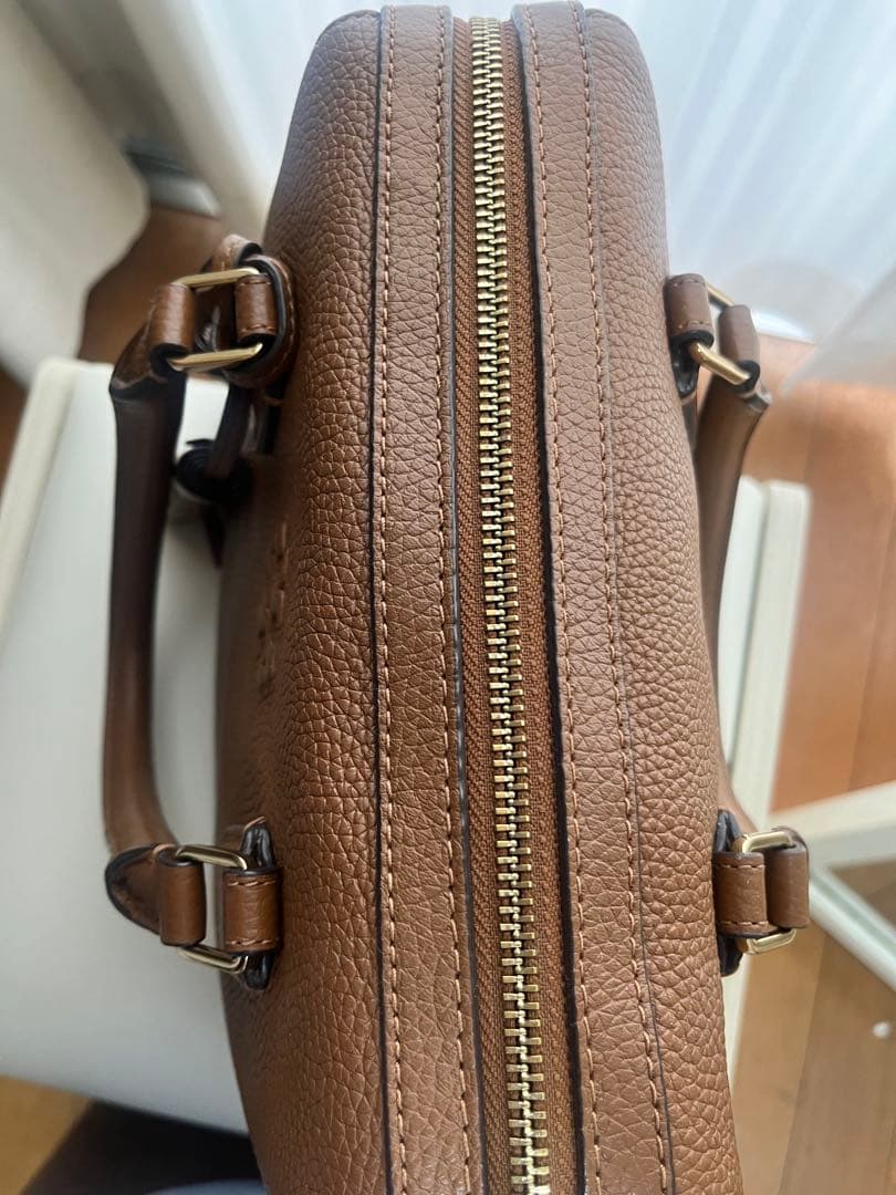 な*ぺ様 ブラウンレザー ハンドバッグ タッセル付き