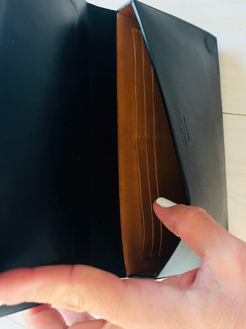 ISAAC REINA クラッチバッグ