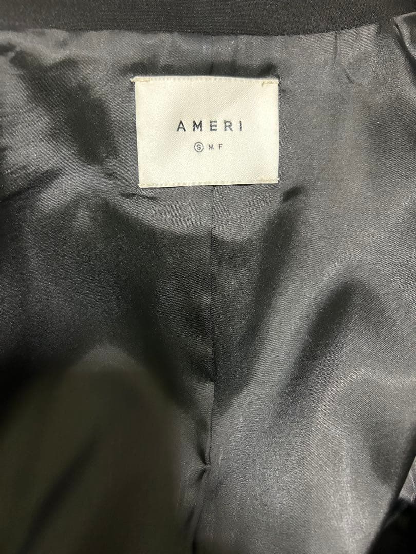 トップス WAVE COLLAR ANGULAR VEST