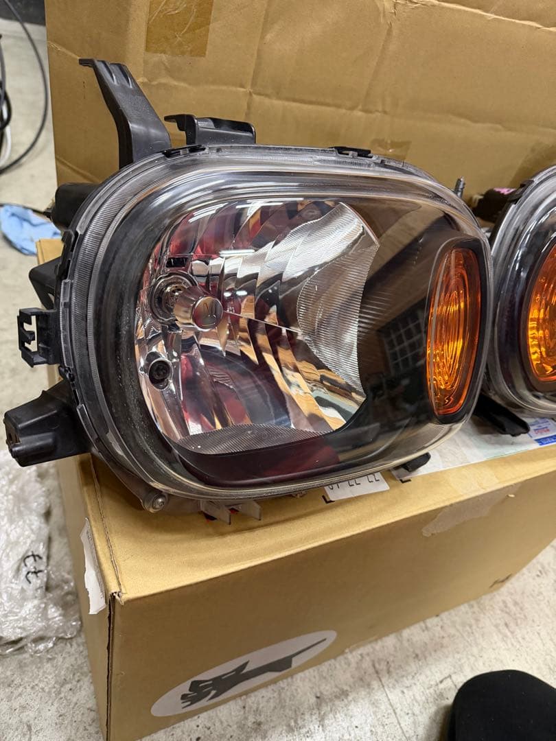 アルトラパンhe22s ヘッドライト(インナーブラック)