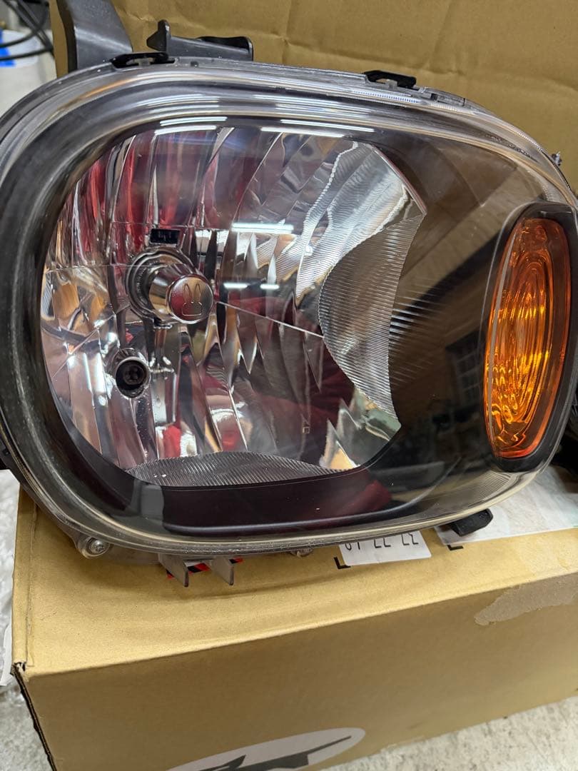 アルトラパンhe22s ヘッドライト(インナーブラック)