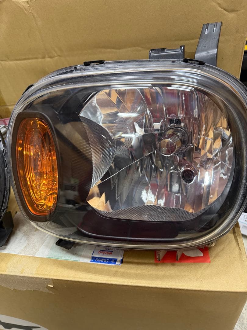 アルトラパンhe22s ヘッドライト(インナーブラック)