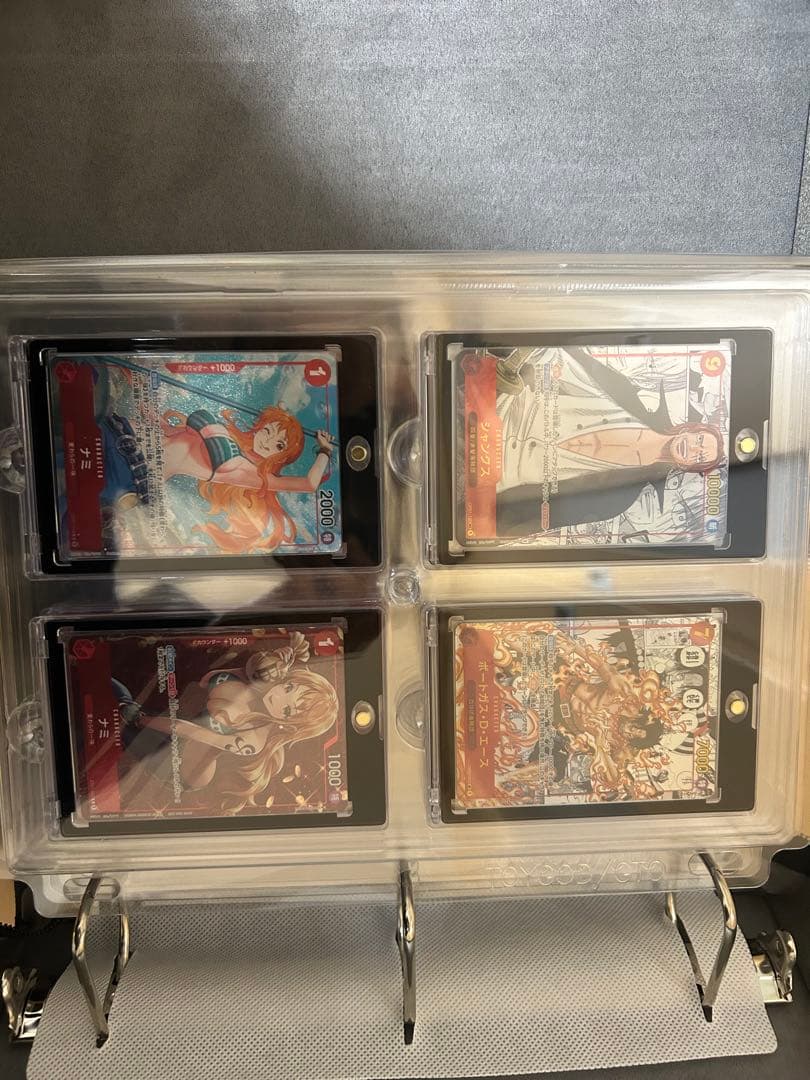 ワンピースカード　引退　マグネットローダー等すべて。コミパラ　説明文お読み下さい