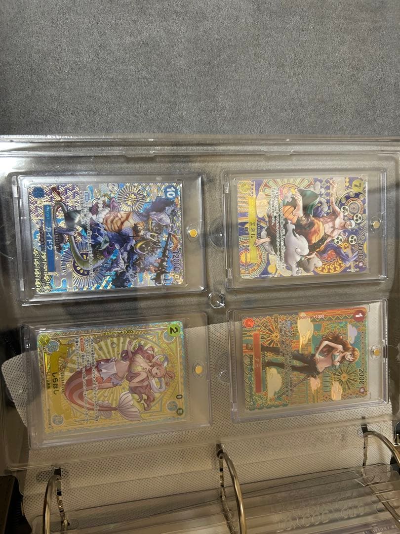 ワンピースカード　引退　マグネットローダー等すべて。コミパラ　説明文お読み下さい