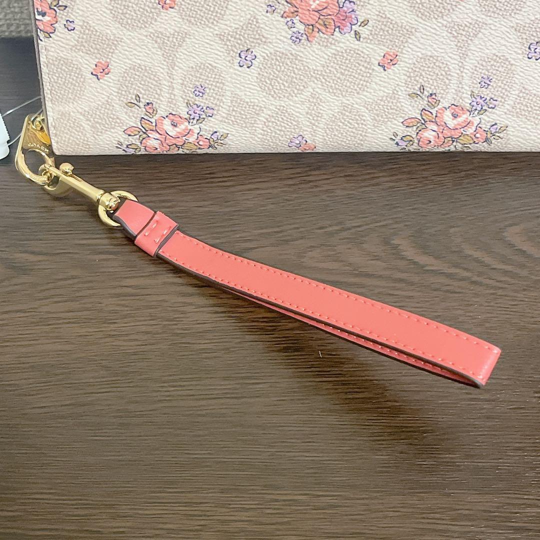 コーチ　 長財布　ベージュ　ストラップ付　花柄　シグネチャー　ラウンドファスナー