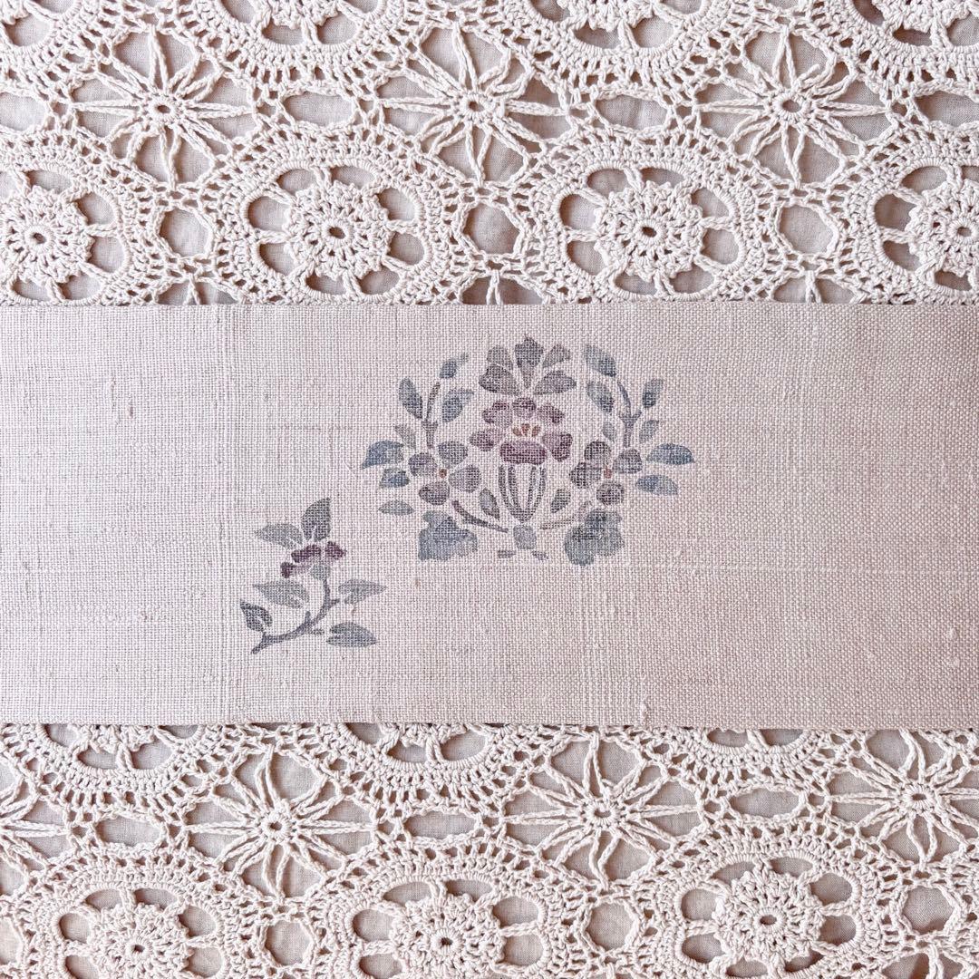 花と鳥の模様 くすんだピンクグレー ピンクベージュ 名古屋帯 紬帯