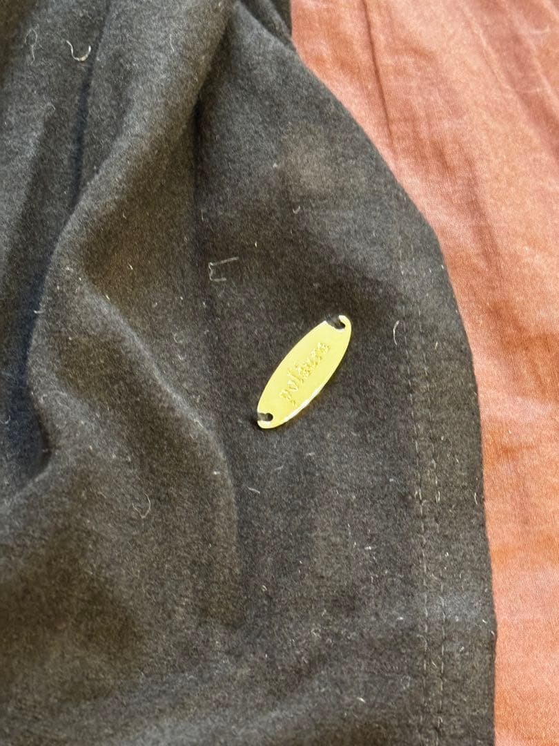 ポローラ poláura アシンメトリードレープロングスリーブトップス