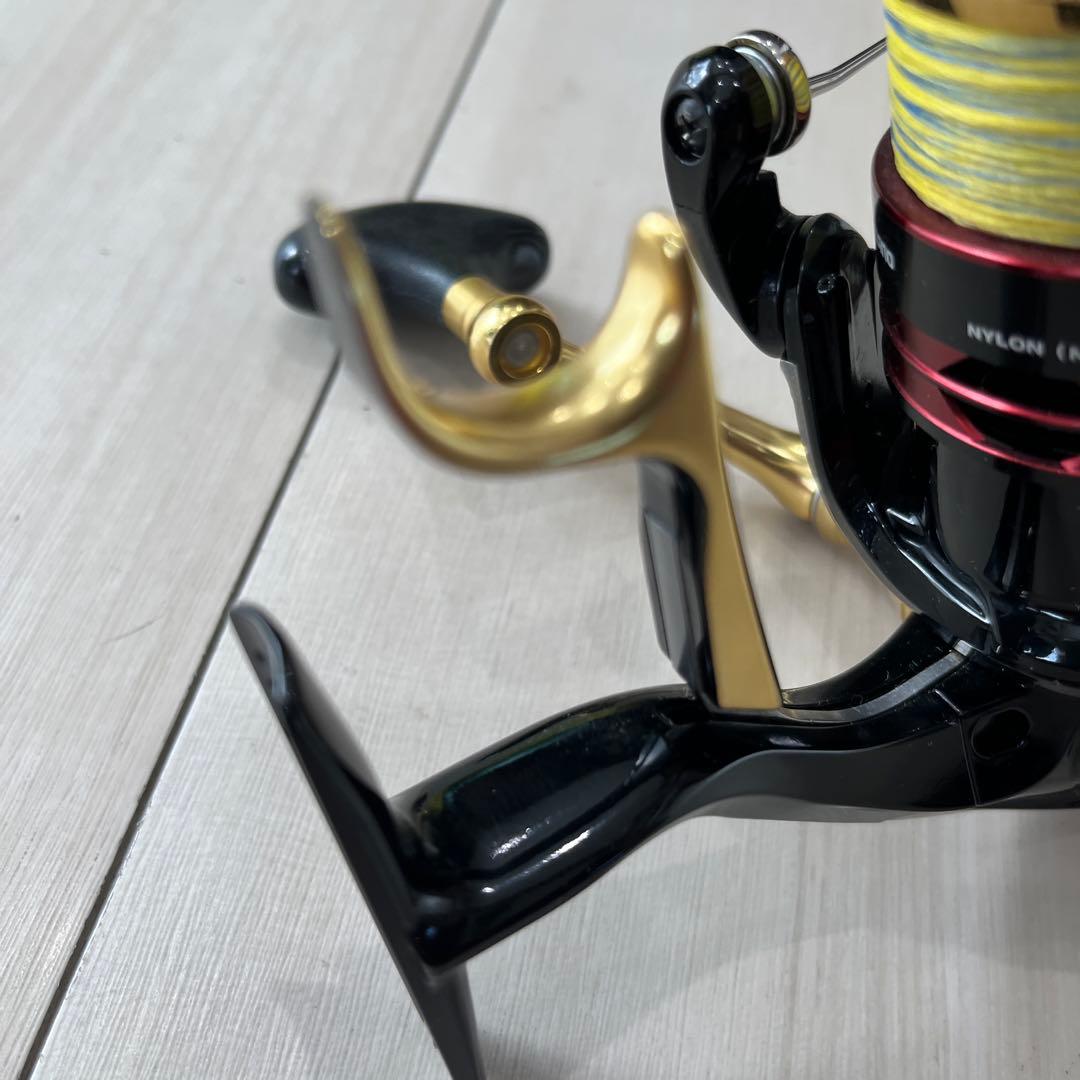 j2500DXG スピニングリール ブラック/ゴールドベイシス竿