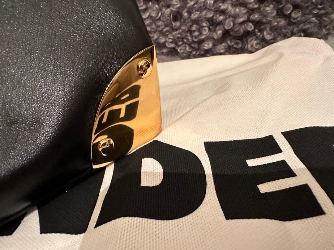 Sacai コーナーメタルクラッチ