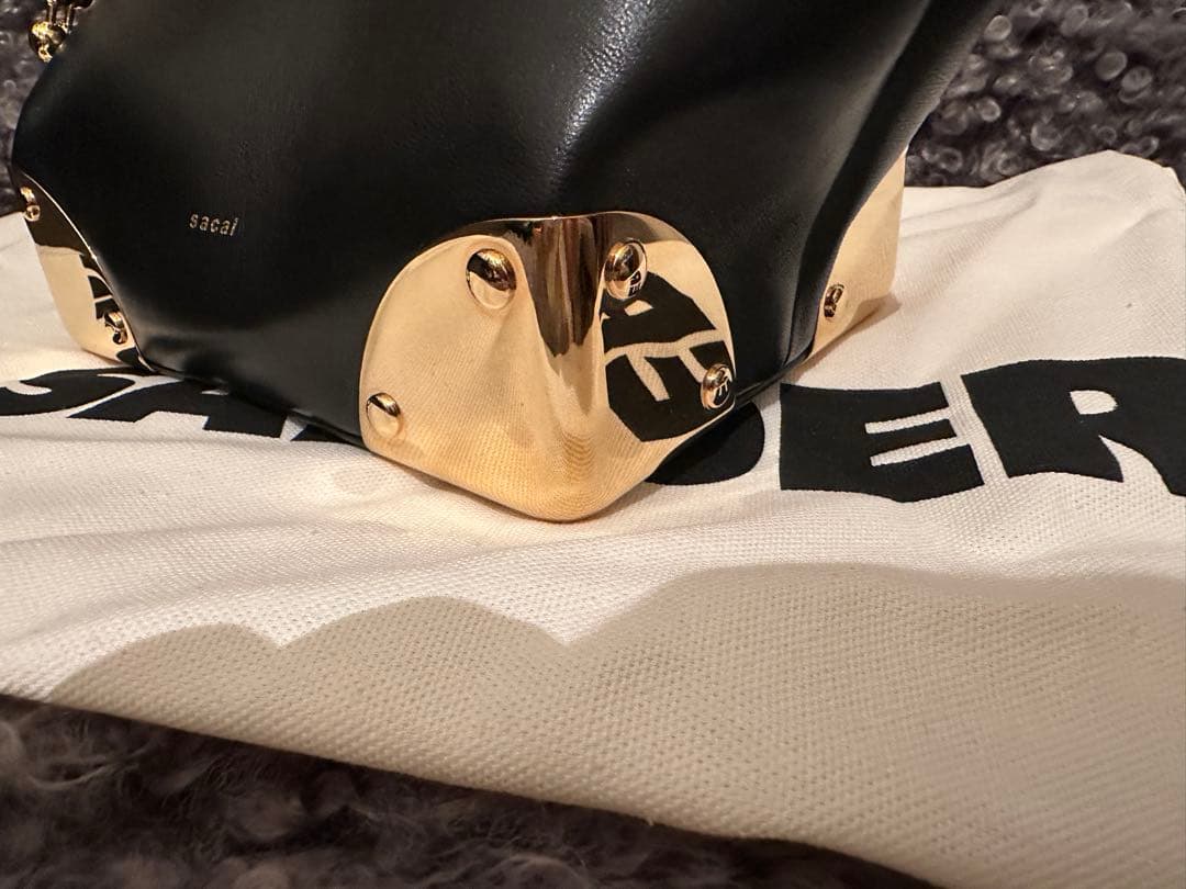 Sacai コーナーメタルクラッチ
