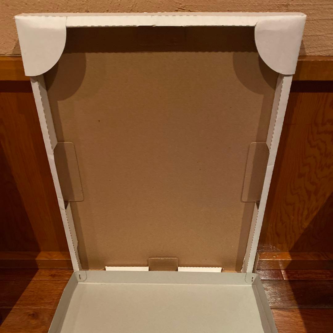 関口コオ・木版画 子供と犬