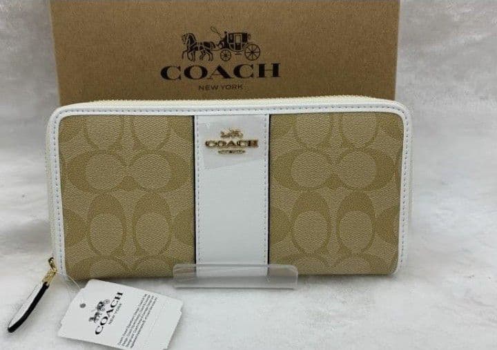 新品未使用コーチ長財布ベージュシグネチャーレディースメンズ送料無料即日発送