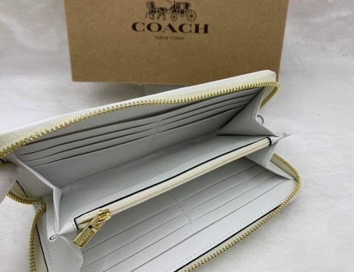 新品未使用コーチ長財布ベージュシグネチャーレディースメンズ送料無料即日発送