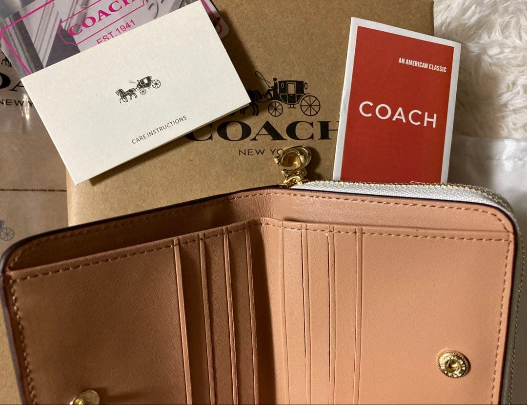 COACH x PEANUTS 二つ折り財布 スヌーピー