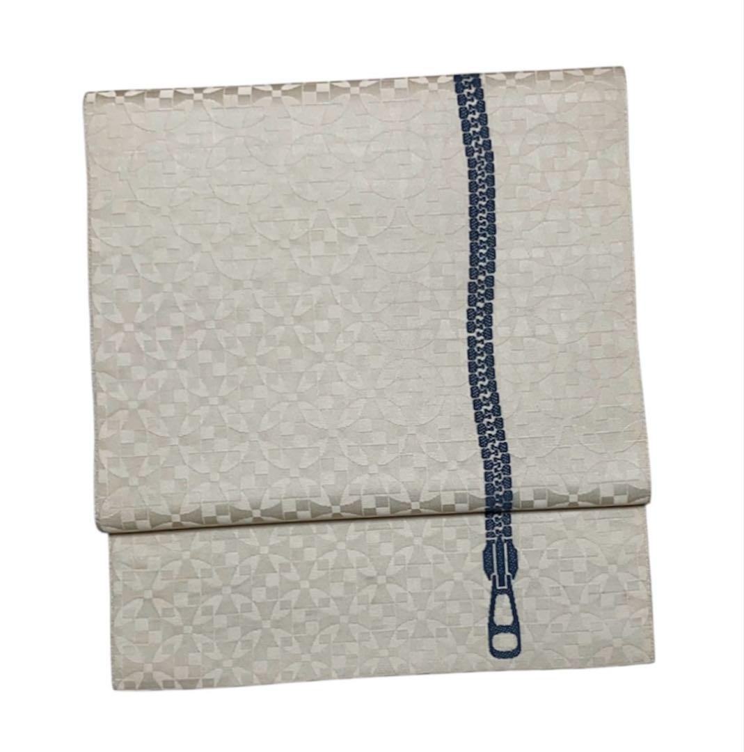 ¨̮⃝ 幾何学模様 ジッパー 博多織 名古屋帯